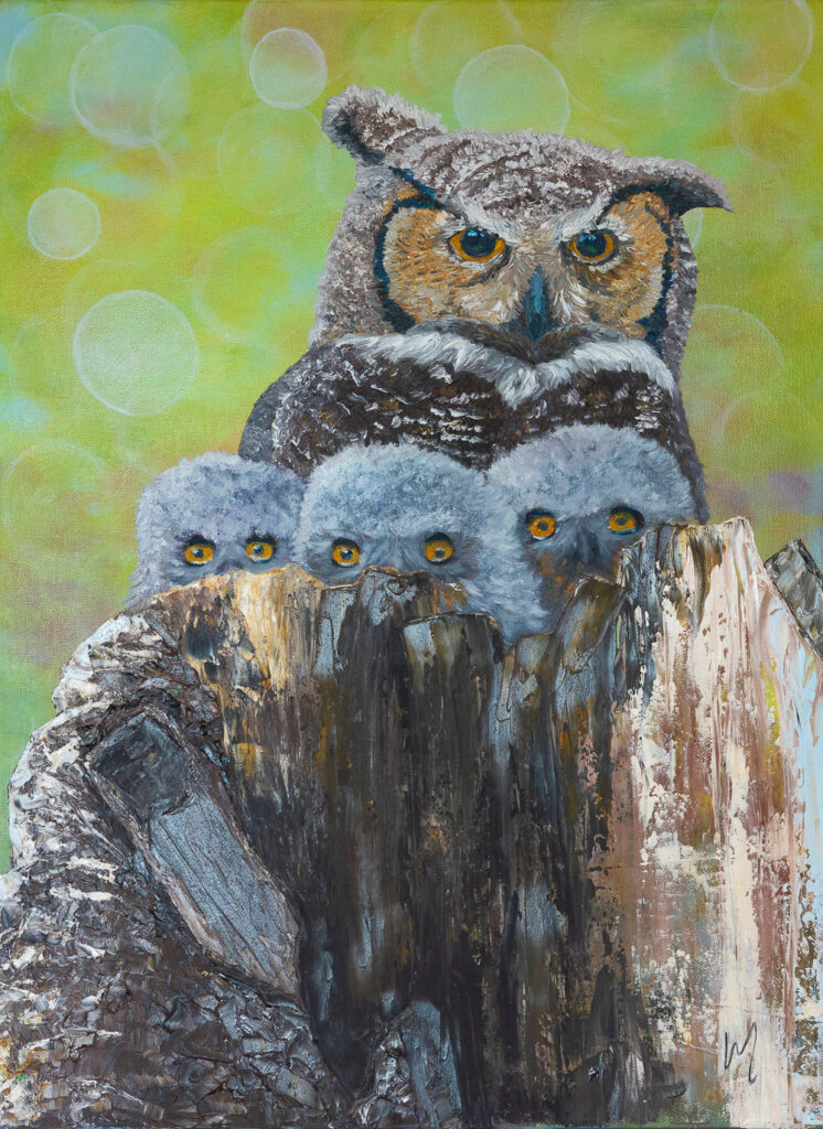 New Beginnings - spotted eagle owl with chics